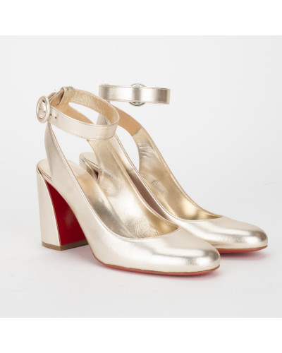 Christian Louboutin złote szpilki