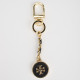 Tory Burch Brelok czarno-złoty