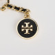 Tory Burch Brelok czarno-złoty