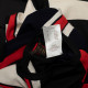 Louis Vuitton sweter w pasy z logo