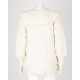 Love Shack Fancy  Sweter bezowy z kwaitakmi