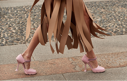 Walking woman in high boots